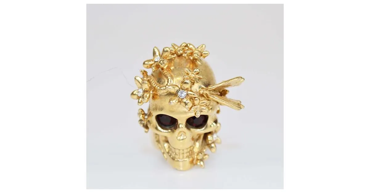 Anillo de calavera en tono dorado con mariposa y flor Alexander McQueen Talla 56 