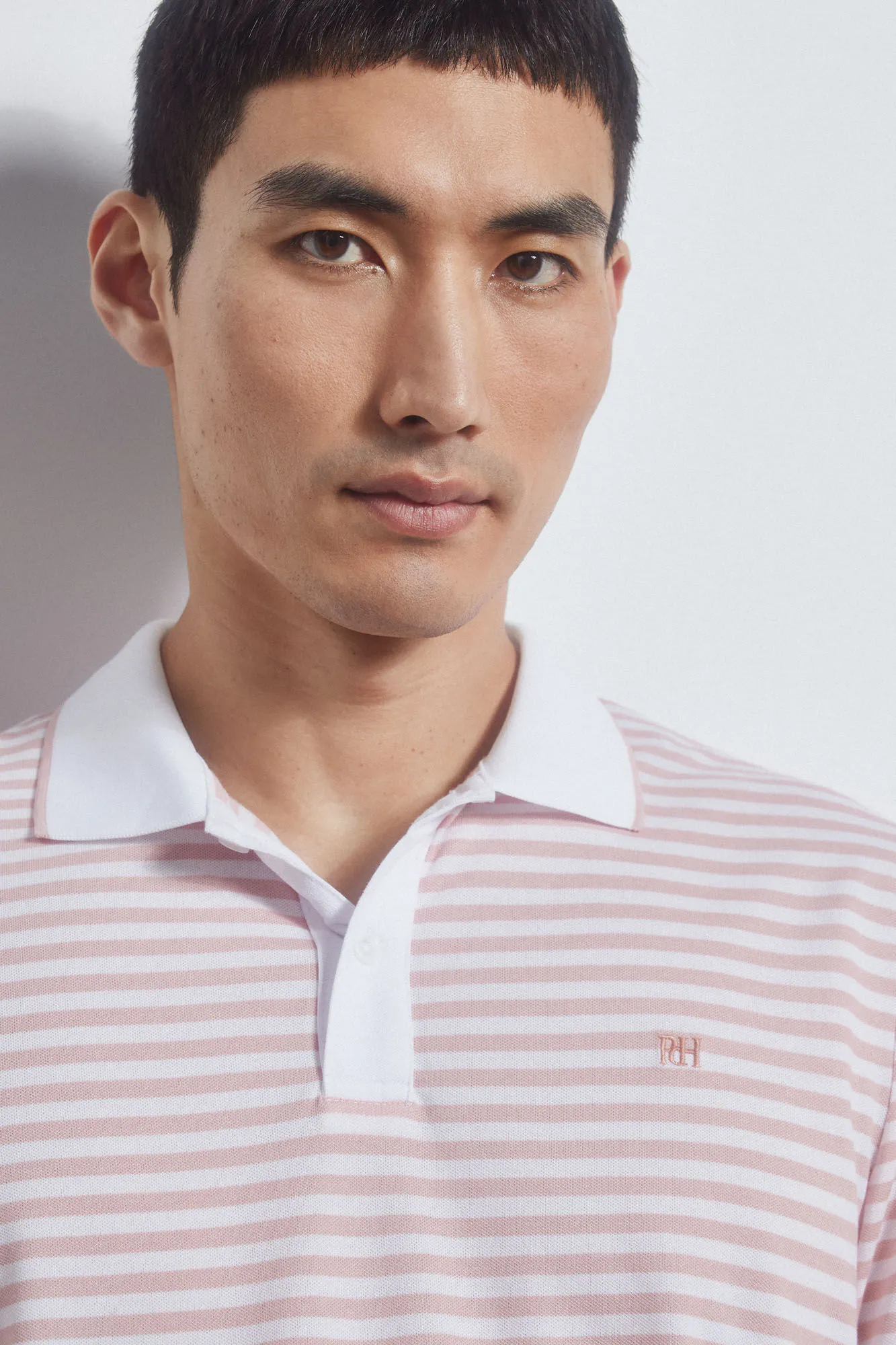 Striped tipped polo shirt